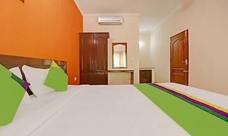 Treebo Trend Green Palm Resorts