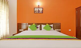 Treebo Trend Green Palm Resorts