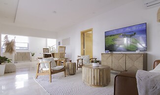New Beachfront Penthouse by RedAwning