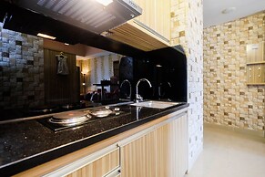 Cozy 1Br Apartment With Workspace At Mustika Golf Residence