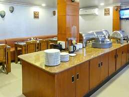 Meenakshi's Sunshine Hotel