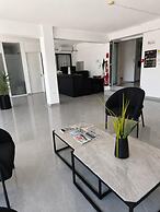 A. Maos Hotel Apartments