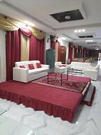 OVERSEAS HOTEL AND SUITES