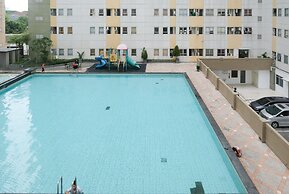 Homey 2Br At Puncak Permai Apartment