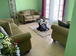 Poinciana House