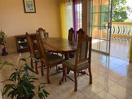 Poinciana House