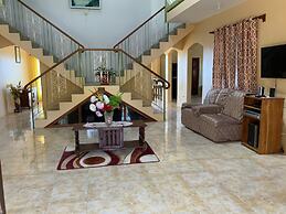 Poinciana House