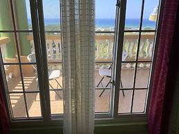 Poinciana House
