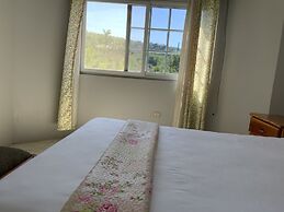 Poinciana House