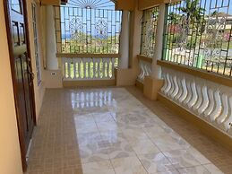 Poinciana House
