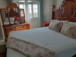 Poinciana House