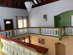 Poinciana House
