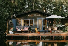 Geel Chalet in Netevallei