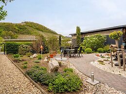 Garden Retreat With Pond View