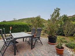 Garden Retreat With Pond View
