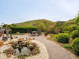 Garden Retreat With Pond View