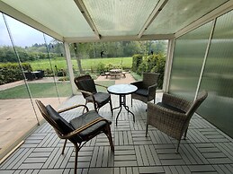 Glass Veranda Chalet in Nature