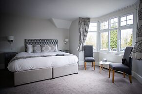 Maple Manor Hotel