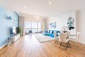 Shoreline Beachfront Luxury Palm