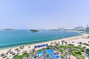 Shoreline Beachfront Luxury Palm