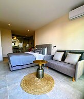 Room-luxury Suite With a Queens Double b