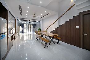T P Deluxe House