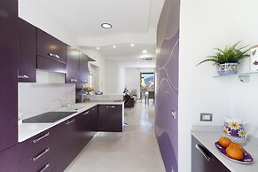 Estate4home- L'Onda Viola