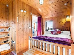 Seaside Log Cabin, Carna