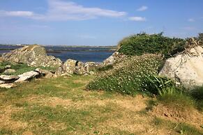 Seaside Log Cabin, Carna