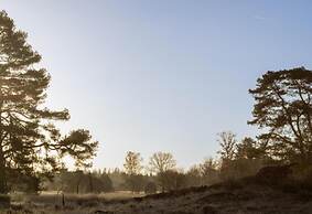 Bungalow met Omheinde Tuin op de Veluwe