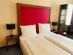 Point Hotel Apartments & Rooms