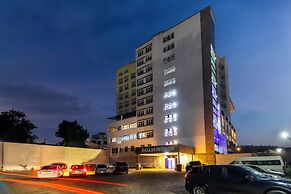 DALLAS PREMIERE HOTEL