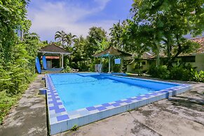 Hotel O Ari Beach Inn