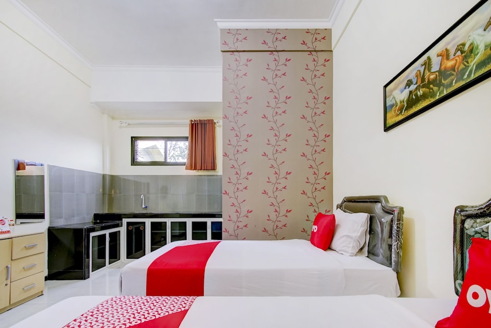 Capital O 90151 Guest House 180