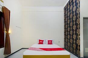 Capital O 90151 Guest House 180
