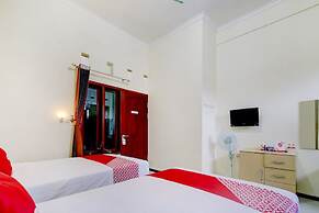 Capital O 90151 Guest House 180
