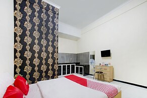 Capital O 90151 Guest House 180
