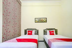 Capital O 90151 Guest House 180