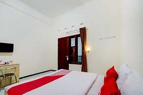 Capital O 90151 Guest House 180