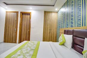 FabHotel Gross inn Suites