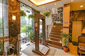 FabHotel Happy Residency