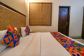 FabHotel Happy Residency