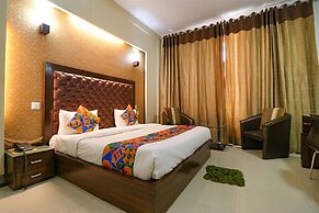 FabHotel Happy Residency