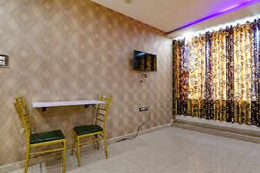 Fabhotel Gold Galaxy