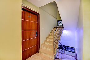 FabHotel Cozzy Inn