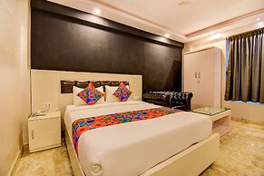FabHotel Cozzy Inn