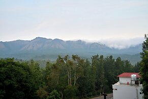 Treebo Sky Vista Suites with Hill View