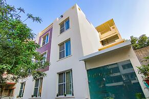Fabhotel Rivlet Inn