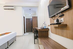 Fabhotel Rivlet Inn