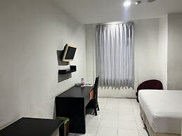 Hotel O Tri Homestay